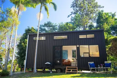 Image de Nestled in Nunderi, this loft style tiny home offers a special retreat for two!