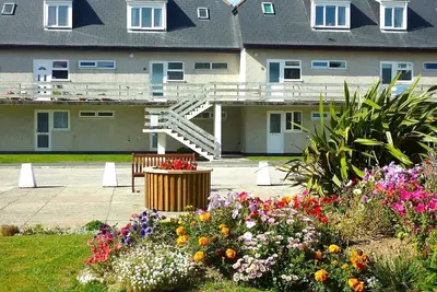 Image de Beachfront apartment with direct beach access!