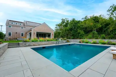 Image de Newly built 5br house w/ Cabana, pool and big yard--walk to town, bike to beach!