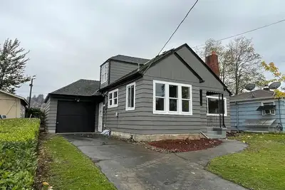 Enjoy the comfort of this four bedroom home in Ne Portland/Roseway Neighborhood!