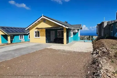 Image de 3b 2b Pure Ocean View on top of the Ridge Overlook Rose hall with Ac & King Beds