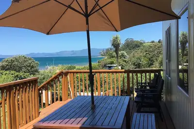 Image de ***New Listing***  Beachfront bach - your slice of paradise.