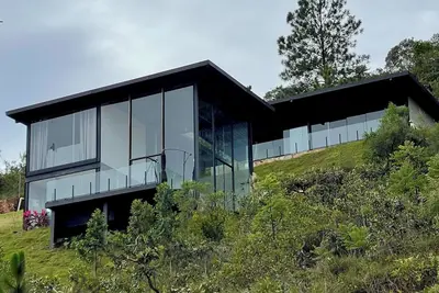 Image de Glass house on the mountain in Macacos, close to waterfalls and ecological trails