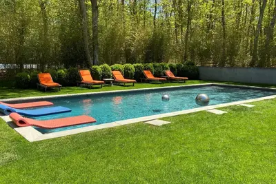 Stylish and recently renovated home with pool, sunlit open floor plan, . . .