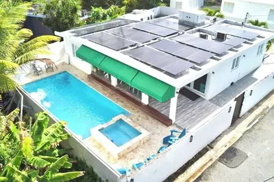 Image de Hear the Waves | Luquillo Stay Walking Distance to the Beach, Nearby Rainforest & Ferry Access