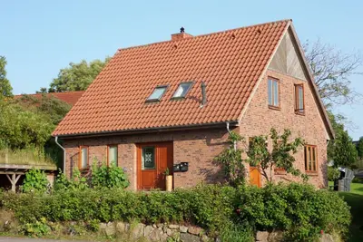 Image de Vacation apartment in Füsing with fireplace