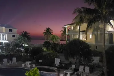 2-bedroom condo in oceanfront complex in Freeport with pool, WiFi, beach chairs.