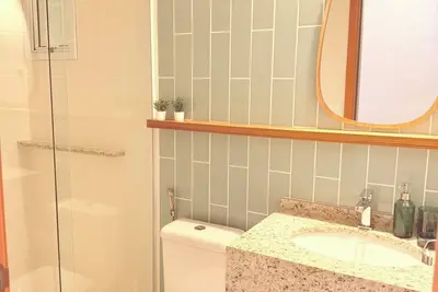 Image de Apt Toninhas 4 min walk to the beach, swimming pool, barbecue and air conditioning