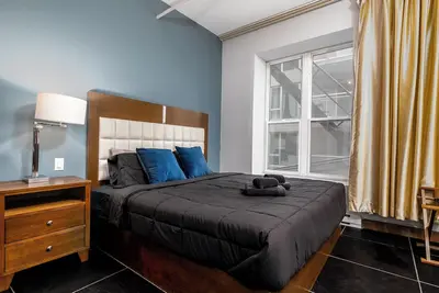 Image de Suite Spacieuse avec lit king Au cœur du Centre-Ville, ambiance festive garantie