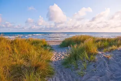 Image de Directly on the cliffs with beach access, beautiful nature in a quiet location.