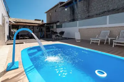 Image de Casa confortável com churrasqueira, rede e Wi-Fi