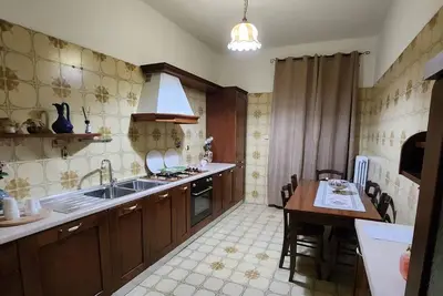 Image de Cozy apartment a few meters from the Baiano highway exit.