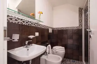 Image de Rossini apartment a few meters from the historic center, ideal for families