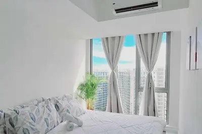Image de Chic 2-bedroom condo with Ac, WiFi in enchanting Parañaque