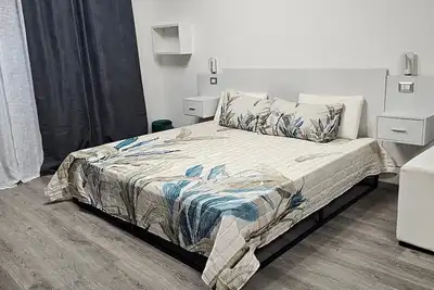Image de Chambre 'Quadrupla' avec Terrasse partagée, Wi-Fi et Climatisation