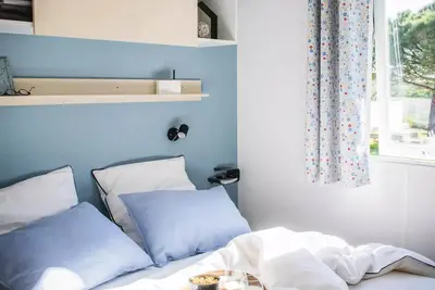 Image de Mobil-home confort 34 m2 (3ch-6/7 pers) + terrasse 6 à 7 personnes - 6 pers. inclus dans le tarif