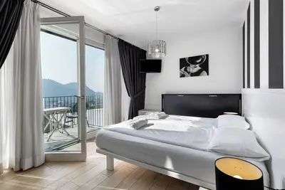 Image de Chambre 'Relais Olivi Superior Milano' avec vue sur lac, Wi-Fi et climatisation