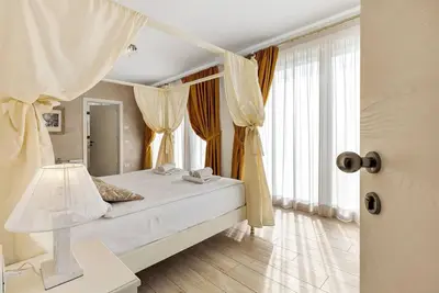 Image de Chambre 'Relais Olivi Deluxe Venezia' avec vue sur lac, Wi-Fi et climatisation