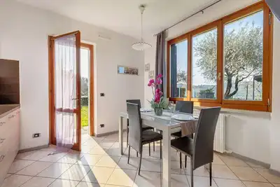 Image de Appartement 'Relais Olivi Garten' avec vue sur lac, Wi-Fi et climatisation