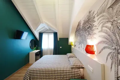 Image de Chambre d'hôtes \"Camera Matrimoniale Deluxe Five\" avec terrasse partagée, Wi-Fi et climatisation