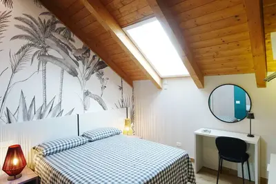 Image de Chambre d'hôtes \"Camera Matrimoniale Deluxe Six\" avec terrasse partagée, Wi-Fi et climatisation
