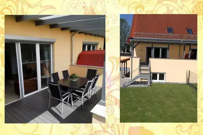Image de Modern semi-detached house with covered terrace and fenced garden.
