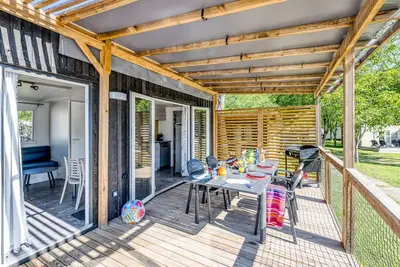 Image de Homeflower Premium 29m² - 2 chambres + terrasse couverte 21m² + Clim + Tv + draps + serviettes 4 personnes