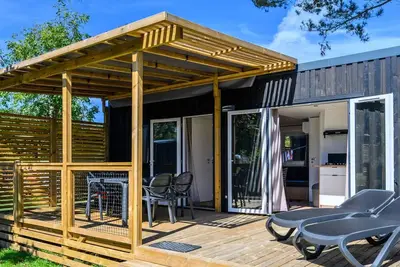 Image de Homeflower Premium 35m² - 3 chambres + terrasse couverte 21m² + Clim + Tv + draps + serviettes 6 personnes