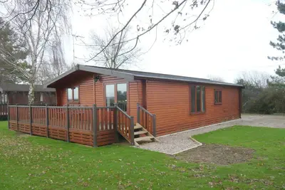 Image de Cottage confortable avec terrasse en bois