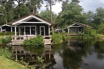 Image de Charmant chalet au bord de l'étang