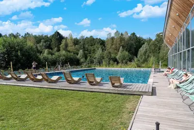 Image de Charmante maison au bord du lac par Belvilla