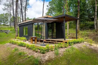 Image de Joli lodge avec vue sur une station naturelle