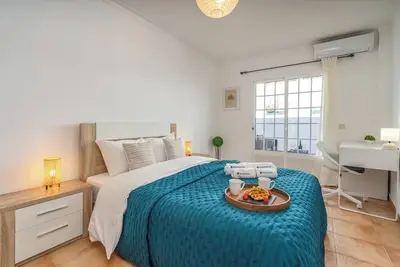 Image de Bright & Cozy House with Terrace by HostWise