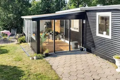 Image de Maison de vacances pour 4 a Allingåbro-By Traum