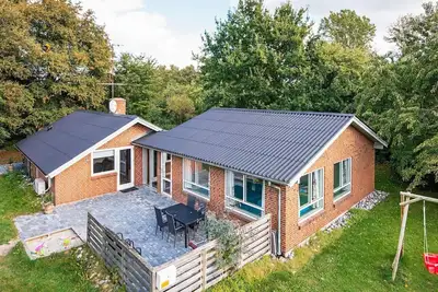 Image de Maison de vacances pour 10 a Glesborg-By Traum
