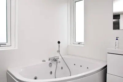 Image de Maison de vacances pour 8 a Brovst-By Traum