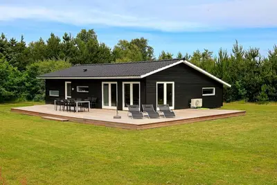 Image de Maison de vacances pour 6 a Strandby-By Traum