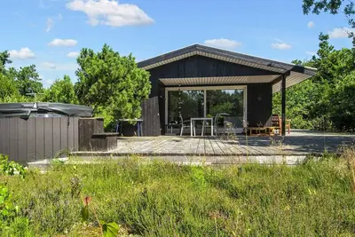 Image de Maison de vacances pour 5 a Glesborg-By Traum