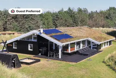 Image de Maison de vacances pour 14 a Blokhus-By Traum