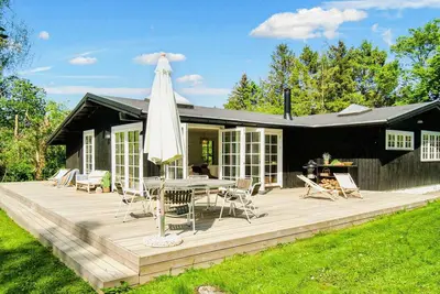 Image de Maison de vacances pour 8 a Vejby-By Traum