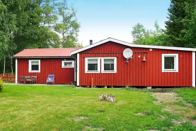 Image de Maison de vacances pour 9 a Hallstavik-By Traum