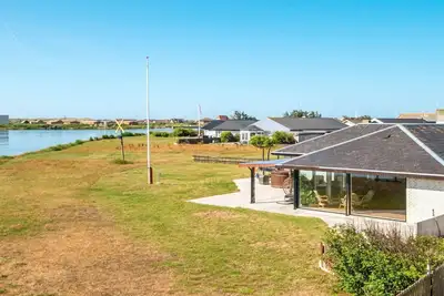 Image de Maison de vacances pour 8 a Ulfborg-By Traum