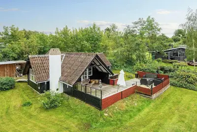Image de Maison de vacances pour 5 a Allingåbro-By Traum