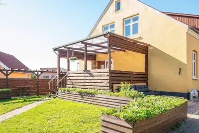 Image de Maison de vacances pour 8 a Grenaa-By Traum