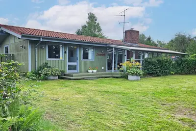 Image de Maison de vacances pour 8 a FĂĄrvang-By Traum
