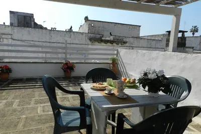Image de House In The Court With Terrace in the historic center of Taviano 7 km from the sea