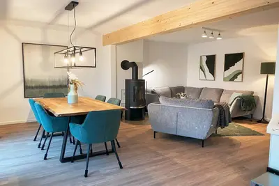 Image de SeeZeit Tossens - With infrared sauna, terrace directly on the water