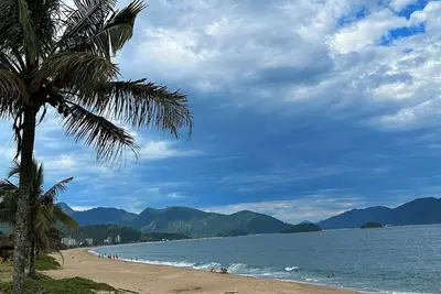 Image de Apto com Wi-Fi, churrasq e quintal a 900m do mar