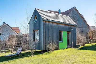 Image de Tiny House « Tanne » avec terrasse partagée, jardin commun et Wi-Fi