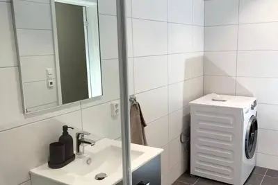 Image de Appartement Duplex Neuf Près de la ville avec Parking Privé Gratuit